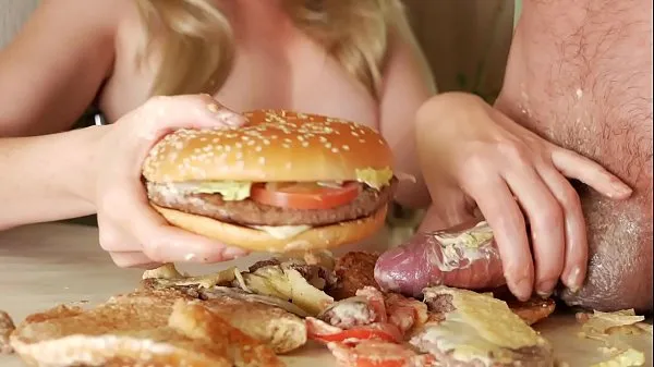 XXX fuck burger. the girl jerks off the guy's dick with a burger. Sperm pouring onto the steak. really favorite burger 내 동영상